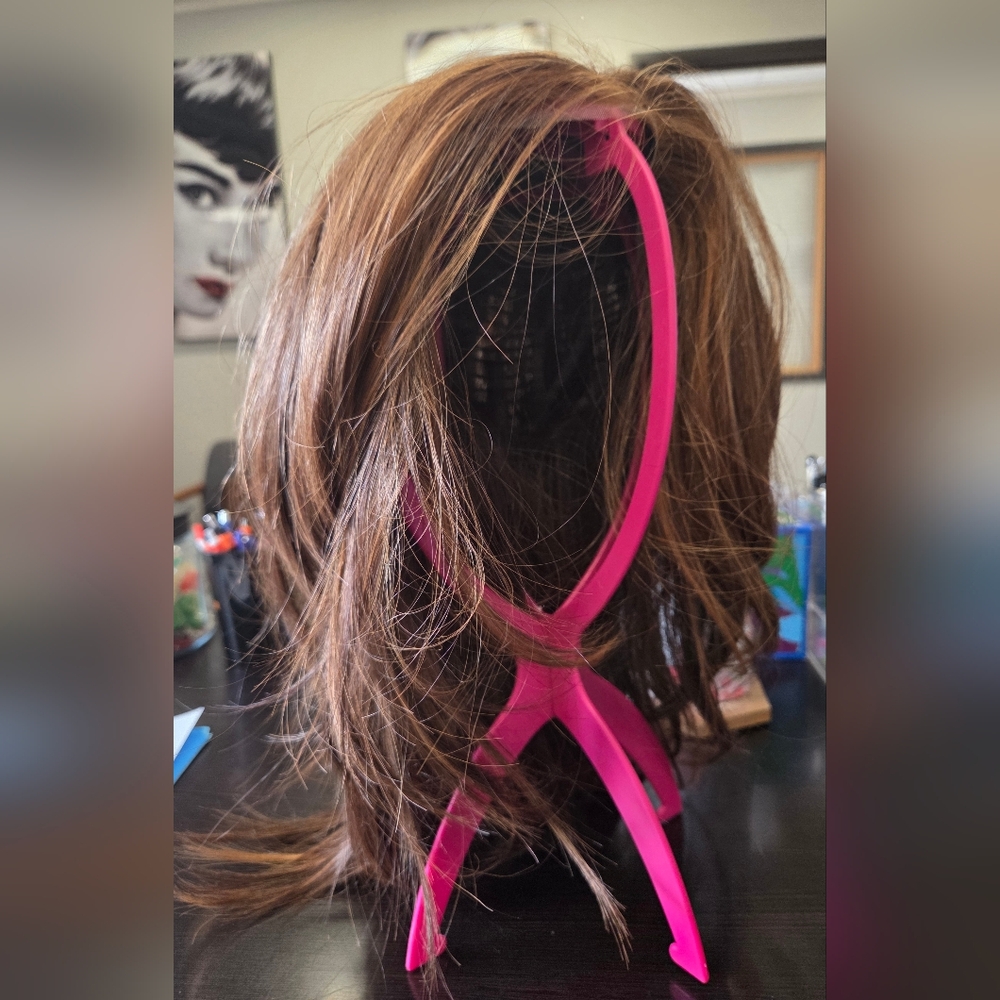 Women’s Brown Wig With Pink Stand